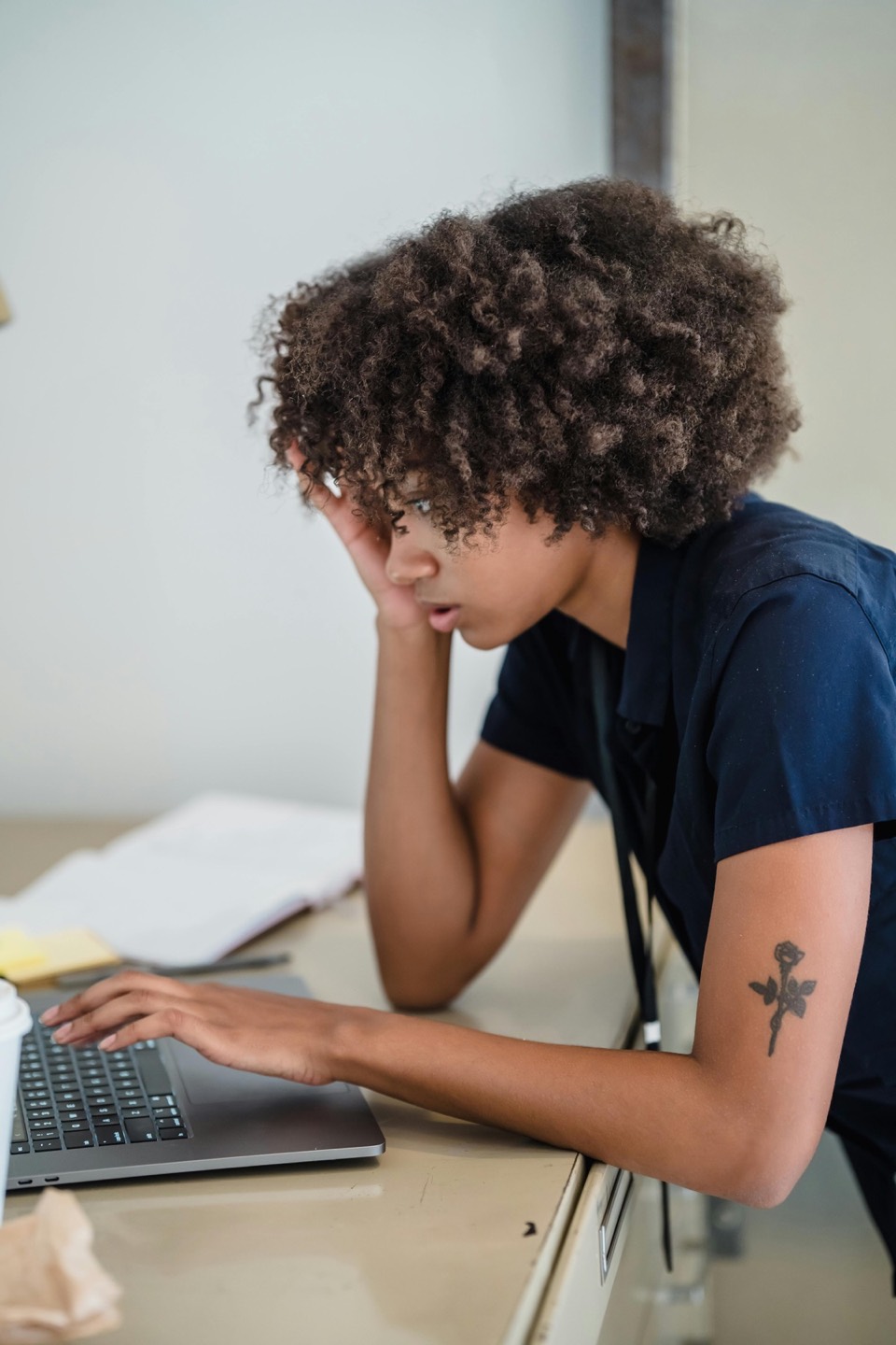 Business owner reviewing local search and website details on a laptop